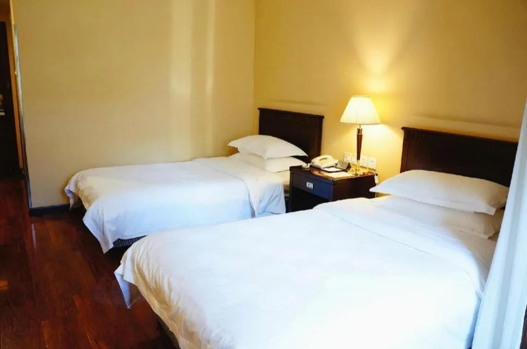 Bed in Hujialou Hot Spring Hotel