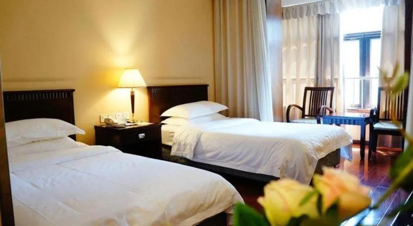 Bed in Hujialou Hot Spring Hotel