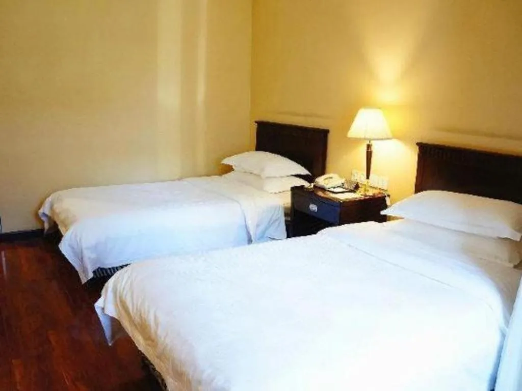 Bed in Hujialou Hot Spring Hotel