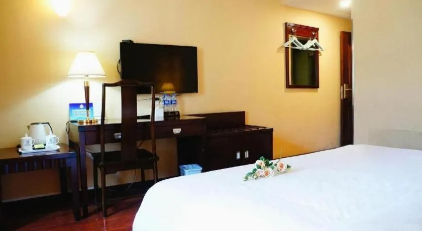 Bed in Hujialou Hot Spring Hotel