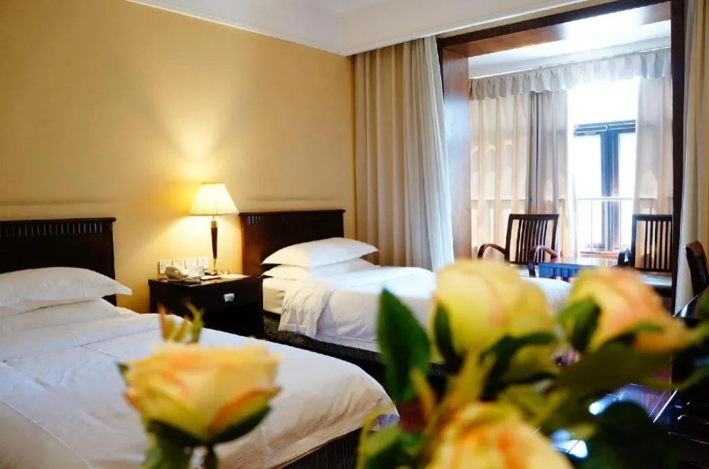 Bed in Hujialou Hot Spring Hotel