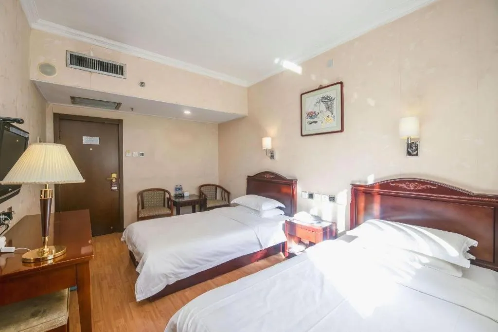 Bed in Hujialou Hot Spring Hotel