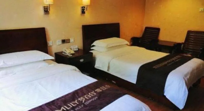 Bed in Hujialou Hot Spring Hotel