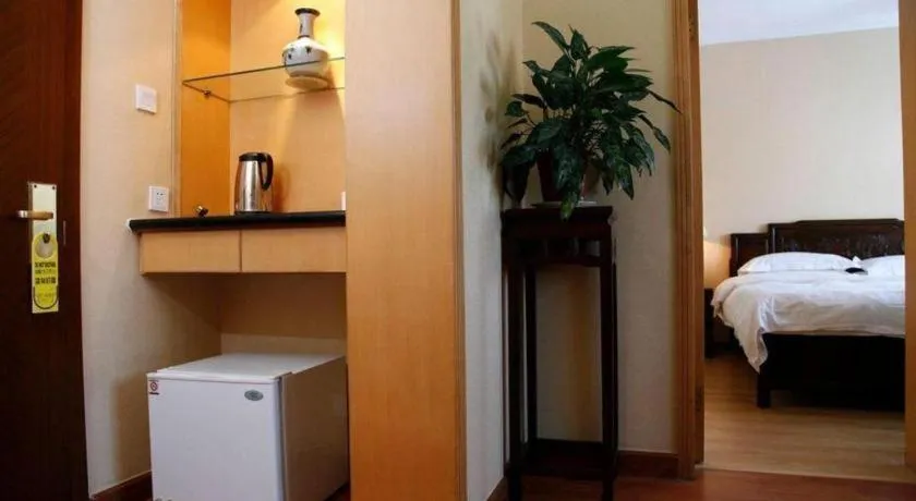 Bed in Hujialou Hot Spring Hotel