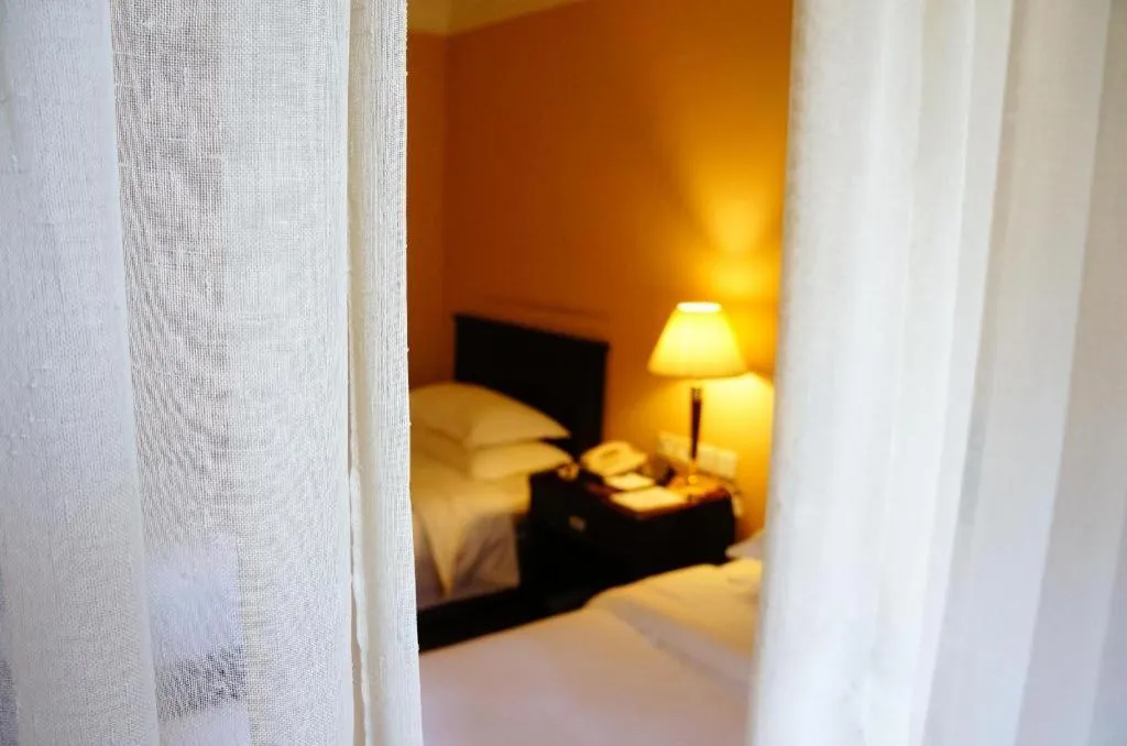 Bed in Hujialou Hot Spring Hotel