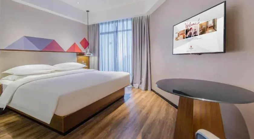 Bed in Borrman Hotel Nanning Railway Station Bed in Borrman Hotel Nanning Railway Station