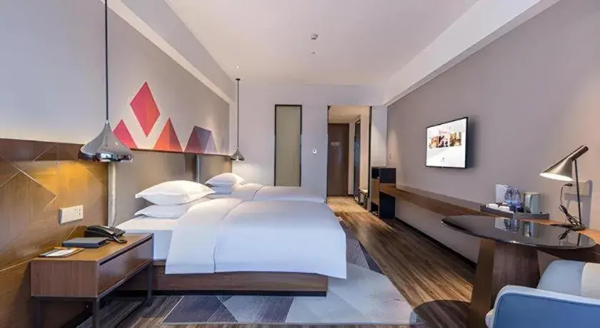 Bed in Borrman Hotel Nanning Railway Station Bed in Borrman Hotel Nanning Railway Station