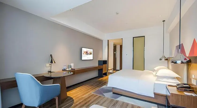 Bed in Borrman Hotel Nanning Railway Station Bed in Borrman Hotel Nanning Railway Station