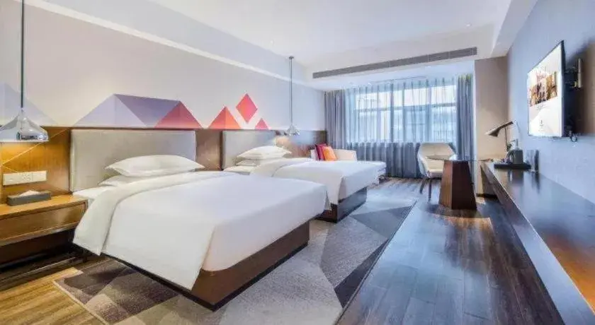 Bed in Borrman Hotel Nanning Railway Station Bed in Borrman Hotel Nanning Railway Station