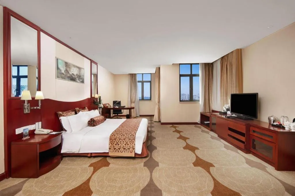 Bed in Longqi Jianguo Hotel Kunshan