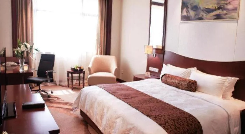 Bed in Longqi Jianguo Hotel Kunshan
