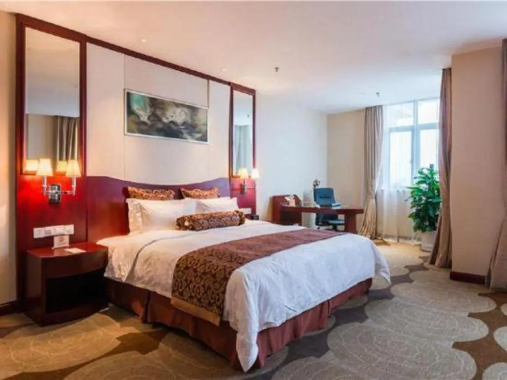 Bed in Longqi Jianguo Hotel Kunshan