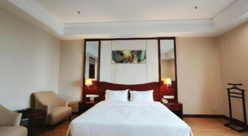 Bed in Longqi Jianguo Hotel Kunshan