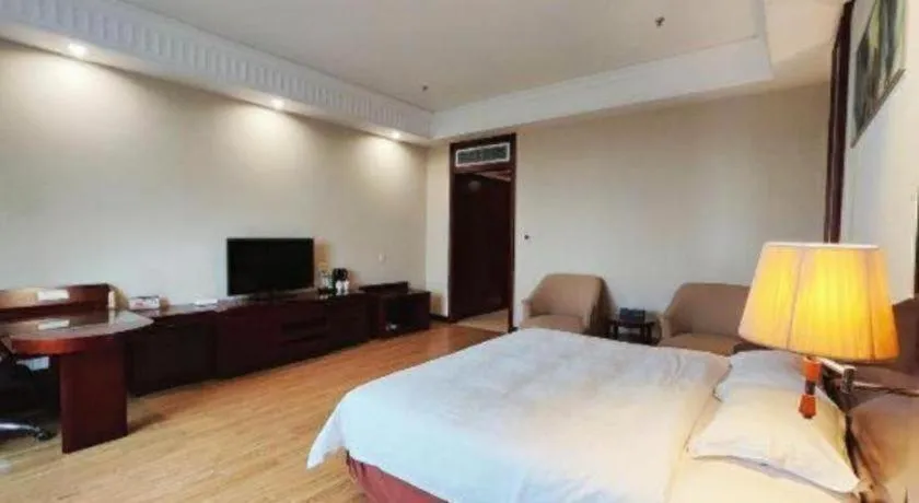 Bed in Longqi Jianguo Hotel Kunshan