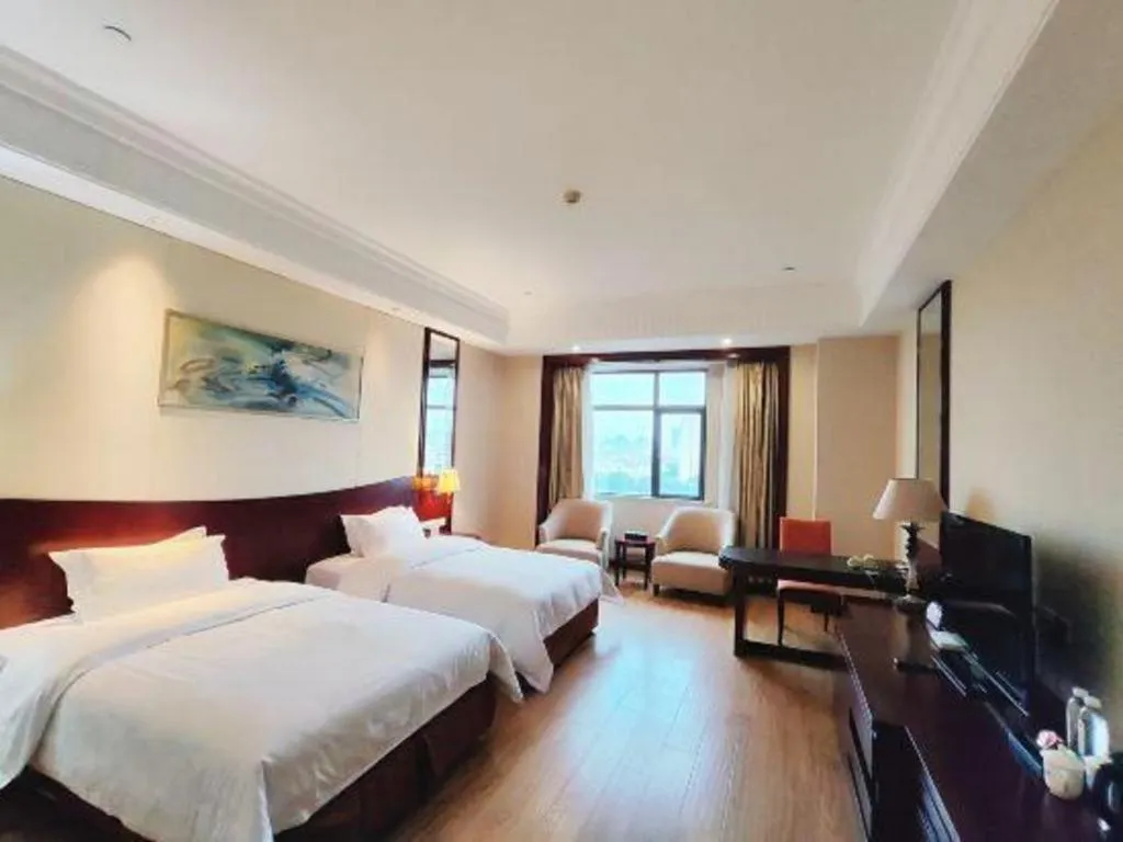 Bed in Longqi Jianguo Hotel Kunshan