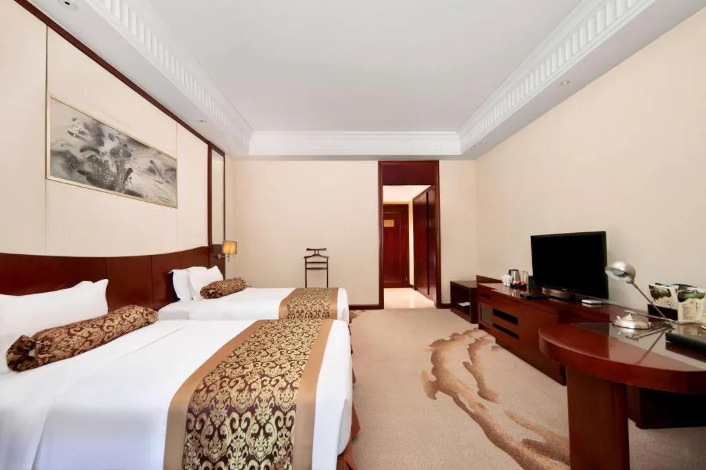 Bed in Longqi Jianguo Hotel Kunshan