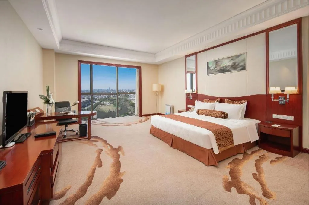 Bed in Longqi Jianguo Hotel Kunshan