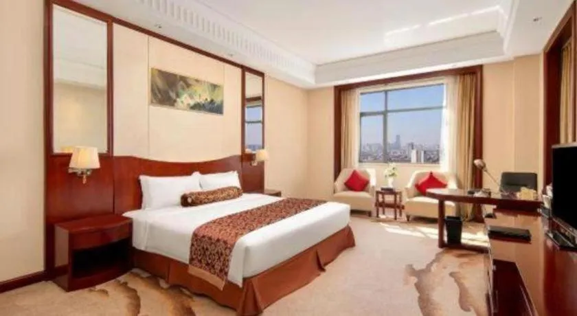 Bed in Longqi Jianguo Hotel Kunshan