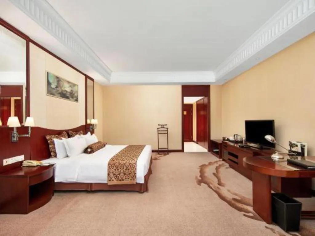 Bed in Longqi Jianguo Hotel Kunshan