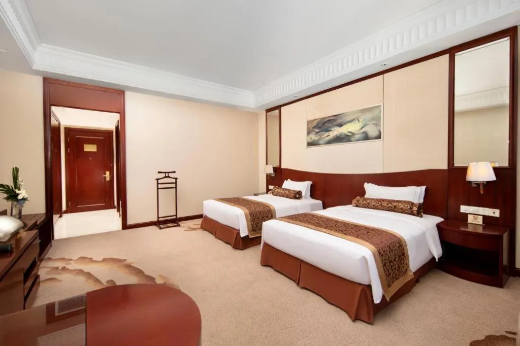 Bed in Longqi Jianguo Hotel Kunshan