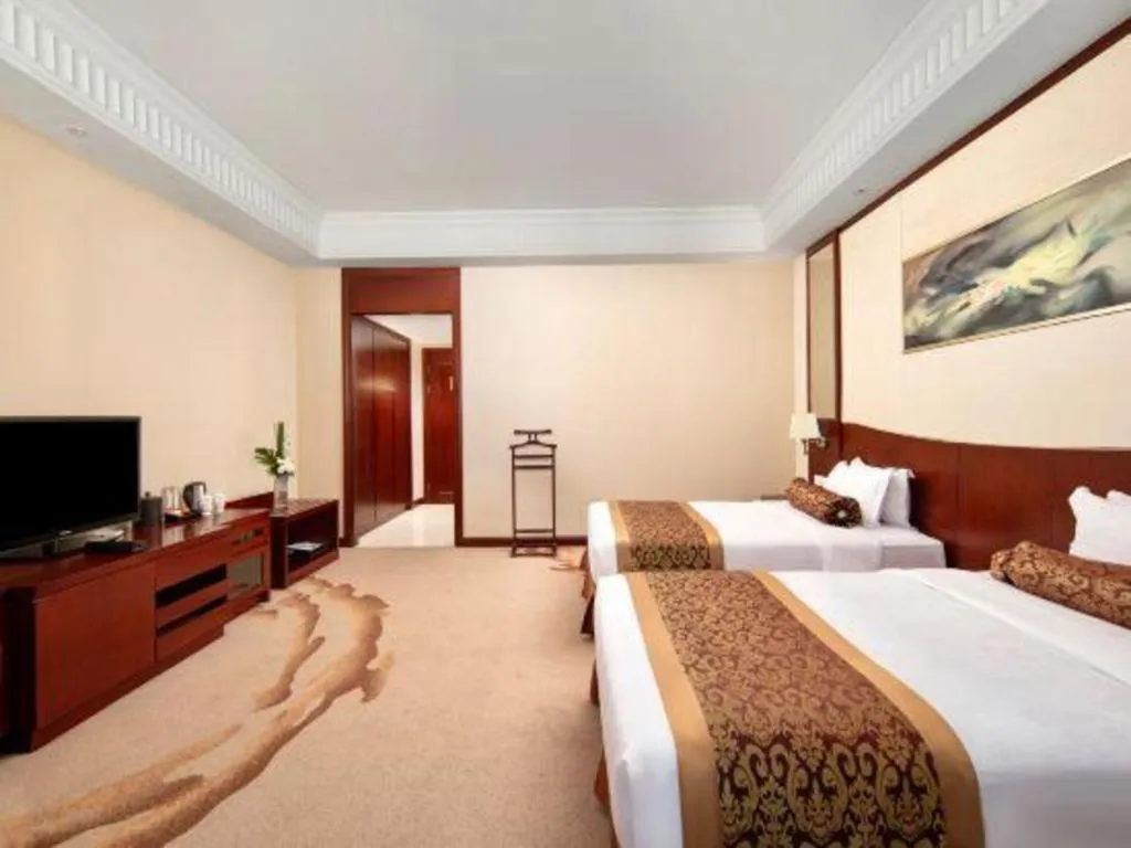 Bed in Longqi Jianguo Hotel Kunshan