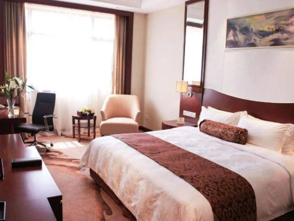 Bed in Longqi Jianguo Hotel Kunshan