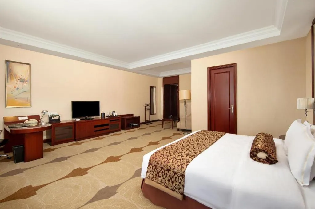 Bed in Longqi Jianguo Hotel Kunshan