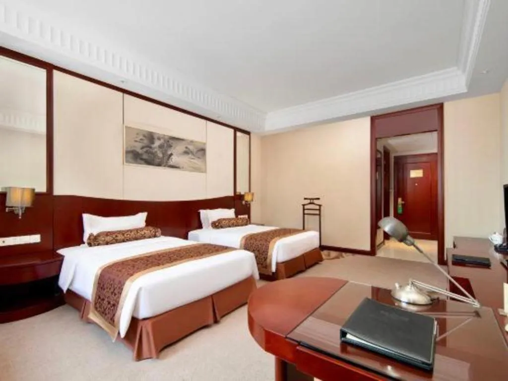 Bed in Longqi Jianguo Hotel Kunshan