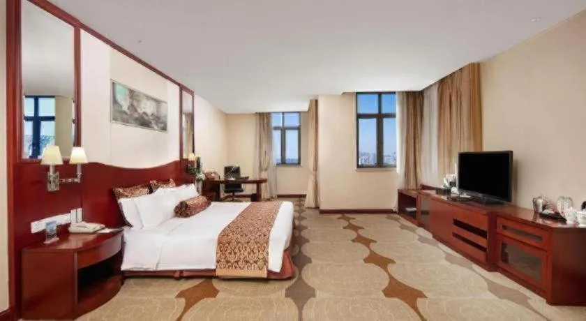 Bed in Longqi Jianguo Hotel Kunshan