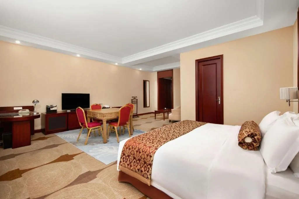 Bed in Longqi Jianguo Hotel Kunshan