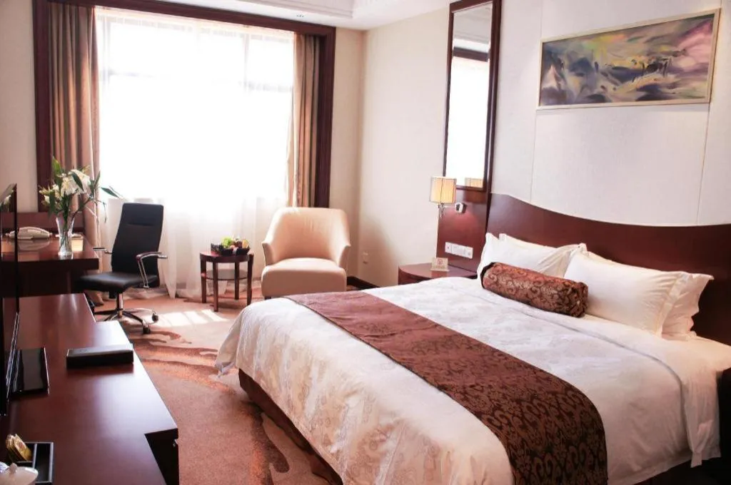 Bed in Longqi Jianguo Hotel Kunshan