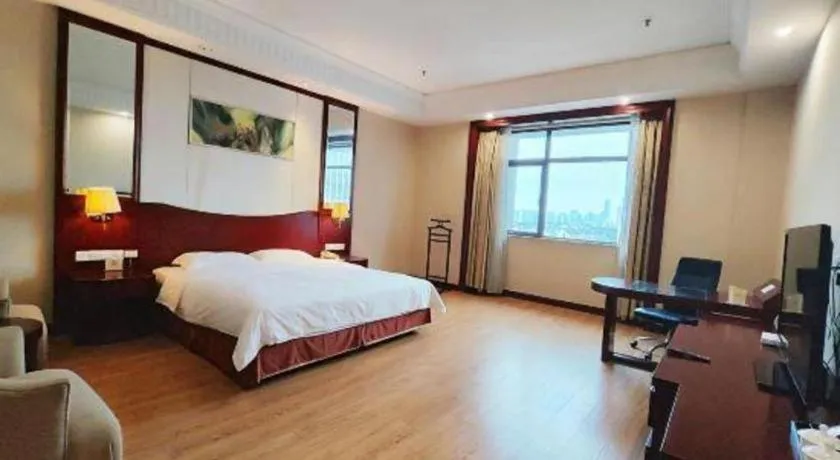 Bed in Longqi Jianguo Hotel Kunshan