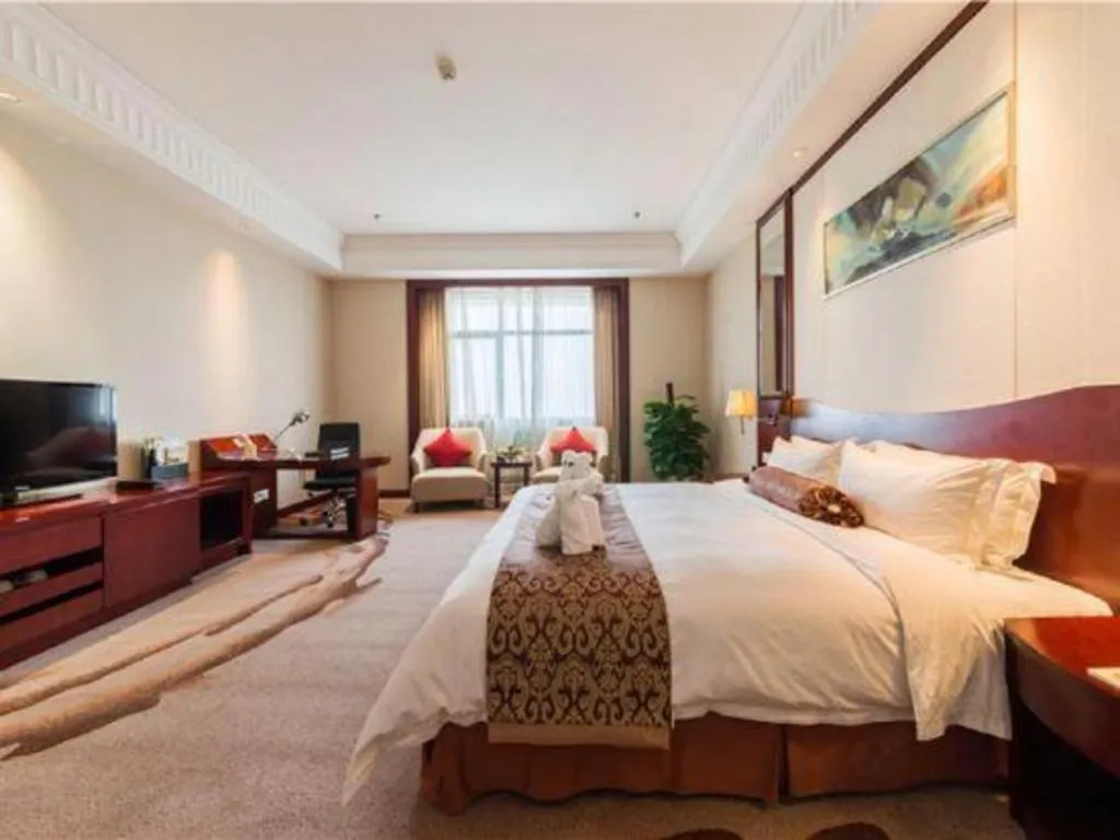 Bed in Longqi Jianguo Hotel Kunshan