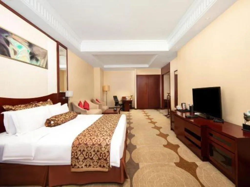 Bed in Longqi Jianguo Hotel Kunshan