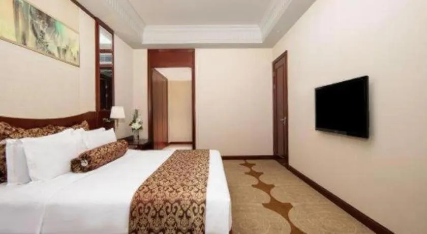 Bed in Longqi Jianguo Hotel Kunshan