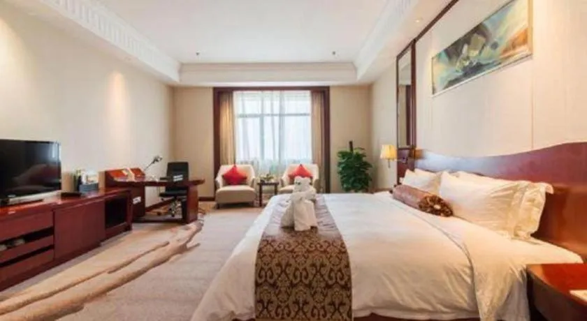 Bed in Longqi Jianguo Hotel Kunshan