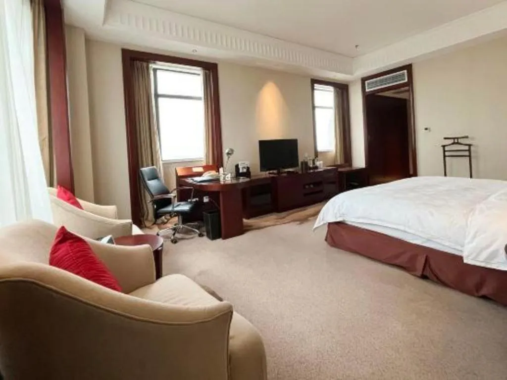 Bed in Longqi Jianguo Hotel Kunshan