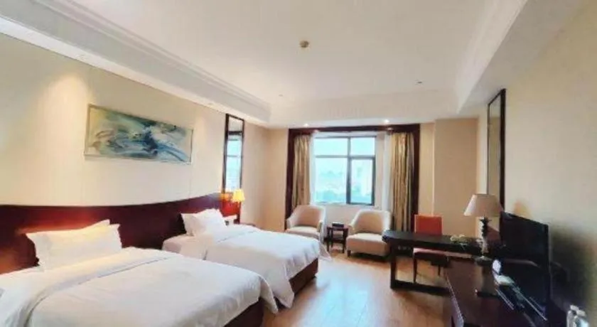 Bed in Longqi Jianguo Hotel Kunshan