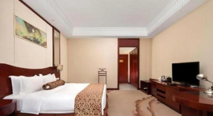 Bed in Longqi Jianguo Hotel Kunshan