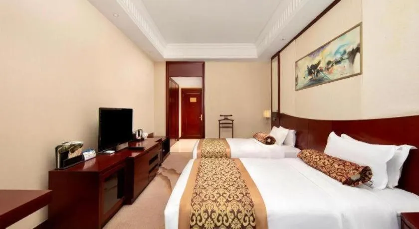 Bed in Longqi Jianguo Hotel Kunshan
