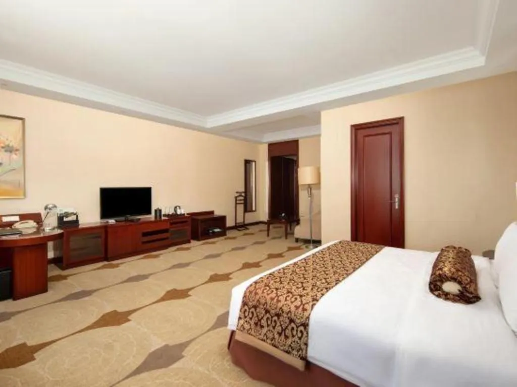 Bed in Longqi Jianguo Hotel Kunshan