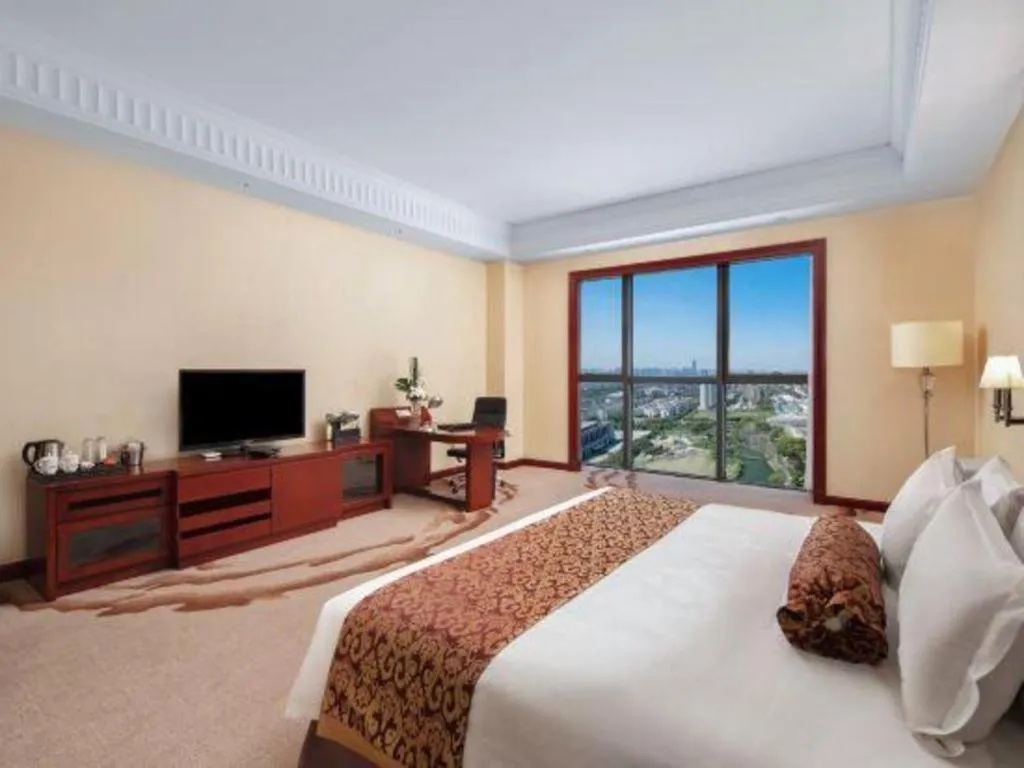 Bed in Longqi Jianguo Hotel Kunshan