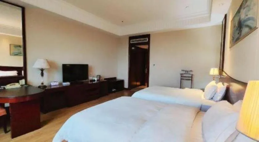 Bed in Longqi Jianguo Hotel Kunshan