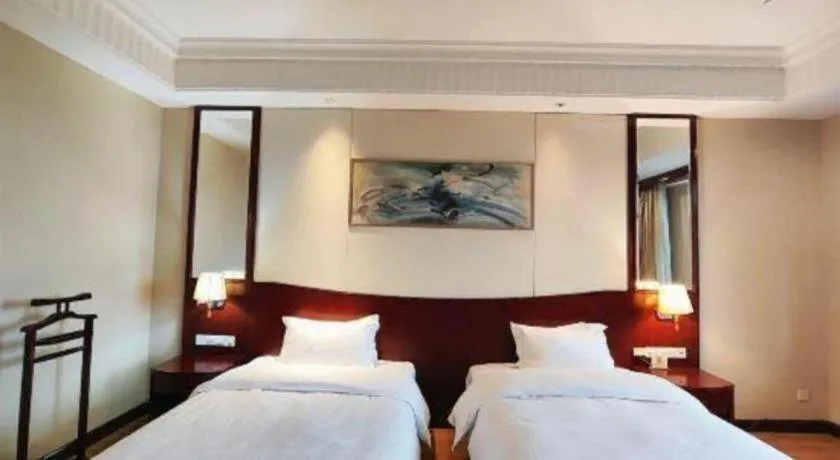 Bed in Longqi Jianguo Hotel Kunshan