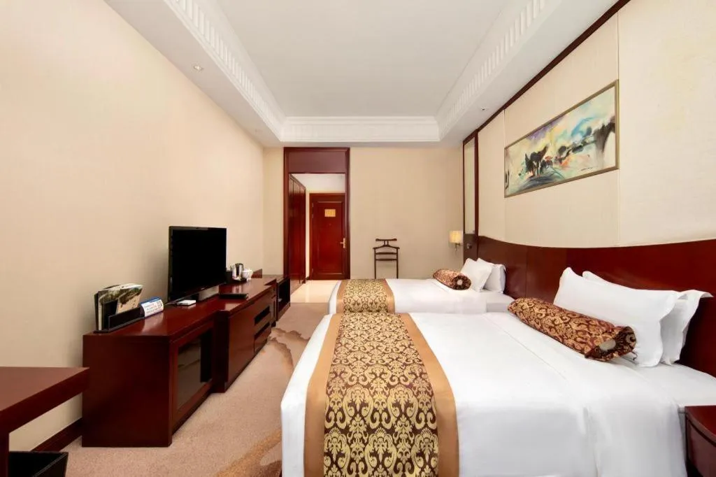 Bed in Longqi Jianguo Hotel Kunshan