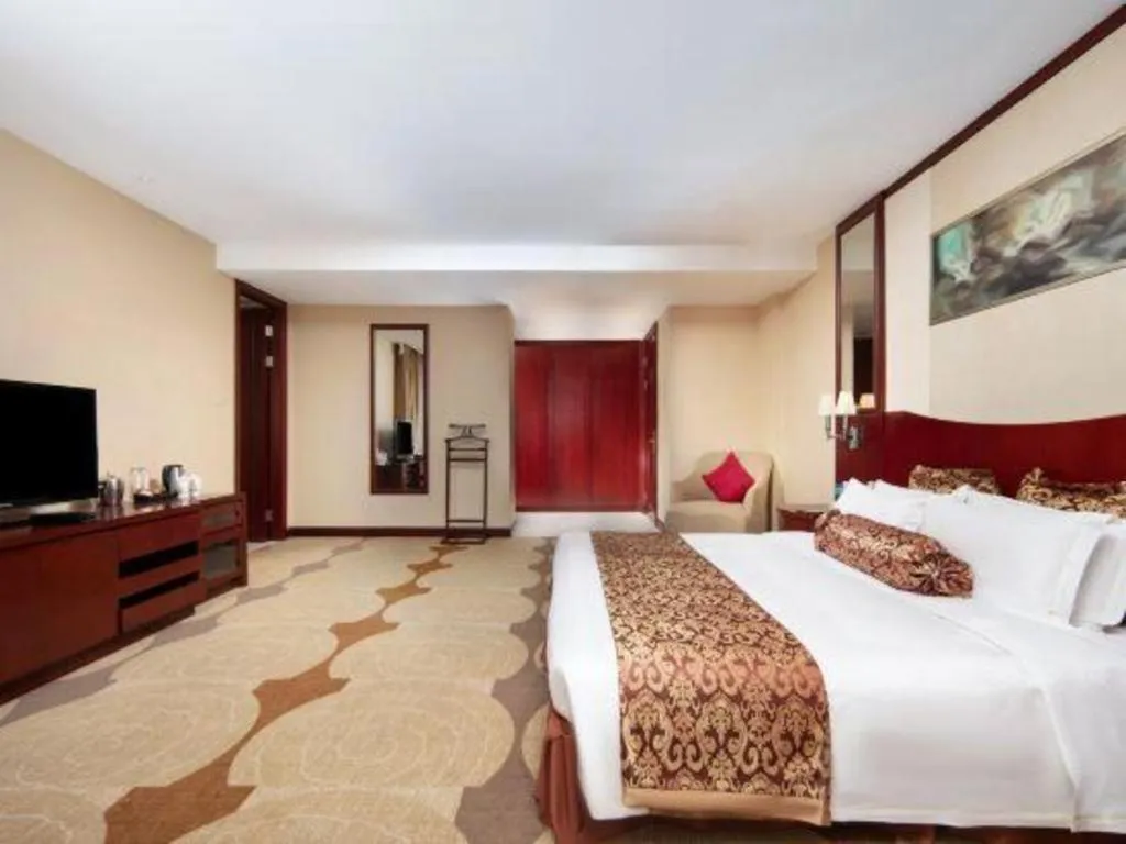 Bed in Longqi Jianguo Hotel Kunshan