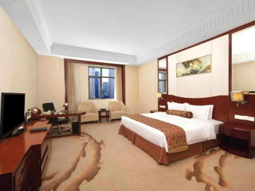 Bed in Longqi Jianguo Hotel Kunshan