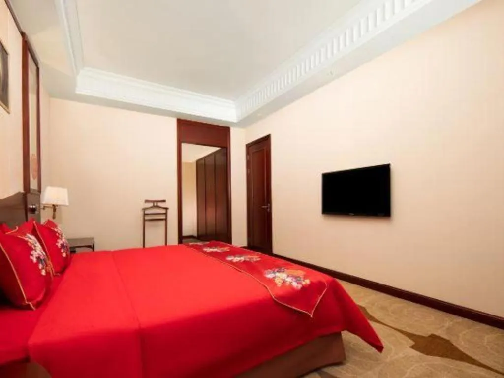 Bed in Longqi Jianguo Hotel Kunshan