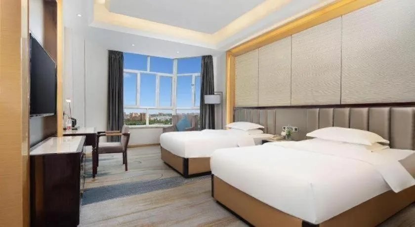Bed in Metropolo Hotel Yining Development Zone Hanma Building