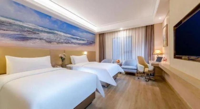 Bed in Vienna Hotel Shenzhen Longgang Baifucheng